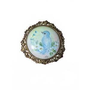 Vintage Hand-Painted Blue Bird Porcelain Brooch with Ornate Frame